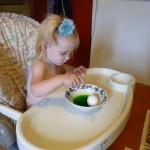 toddler coloring an Easter egg toddler coloring an Easter egg