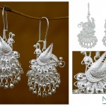 silver peacock dangle earrings