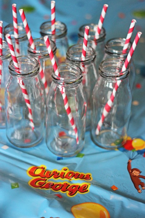 Curious George Birthday Party Milk Bottles with Red Paper Straws